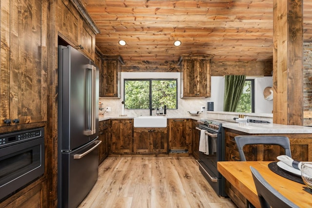 41831 Saddleback Rd, Shaver Lake, CA 93664 - kitchen with high end refrigerator, wooden ceiling, a sink, electric stove, and healthy amount of natural light