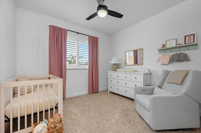 1780 N Avignon Ln, Clovis, CA 93619 - bedroom featuring a nursery area, light colored carpet, a ceiling fan, and baseboards