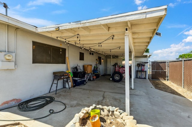 119 Magnolia Ave, Lemoore, CA 93245 - view of parking featuring a gate