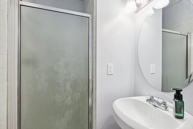 119 Magnolia Ave, Lemoore, CA 93245 - bathroom with a sink and a stall shower