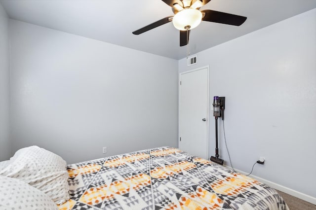 119 Magnolia Ave, Lemoore, CA 93245 - carpeted bedroom with baseboards and a ceiling fan