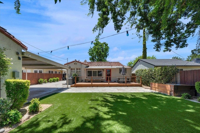 739 E Harvard Ave, Fresno, CA 93704 - rear view of property with a wooden deck, a patio, central air condition unit, and a tile roof