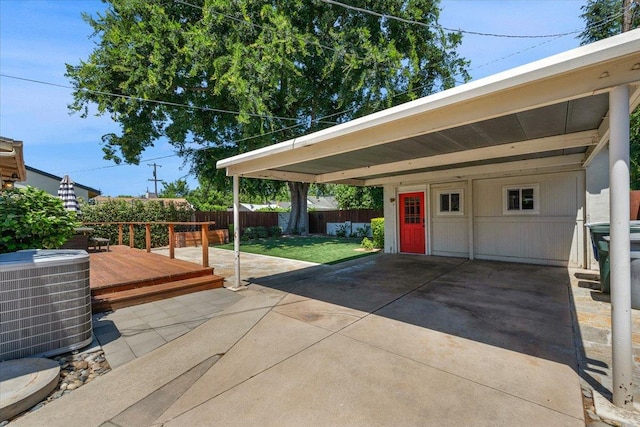 739 E Harvard Ave, Fresno, CA 93704 - view of patio featuring central AC, a deck, and a carport