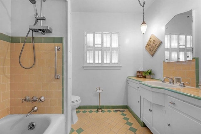 739 E Harvard Ave, Fresno, CA 93704 - full bathroom with vanity, toilet, bathtub / shower combination, tile patterned floors, and baseboards