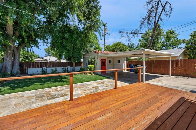 739 E Harvard Ave, Fresno, CA 93704 - deck featuring an outdoor structure, a carport, and a patio area
