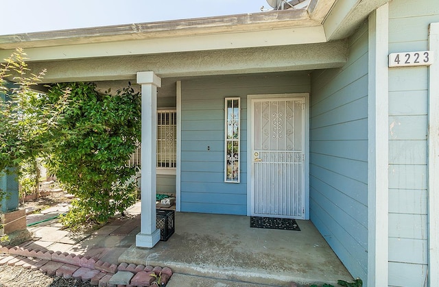 4223 W Yale Ave, Fresno, CA 93722 - property entrance featuring covered porch