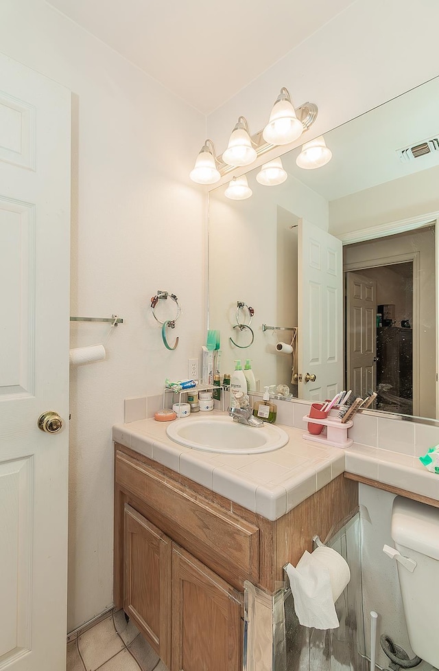 4223 W Yale Ave, Fresno, CA 93722 - bathroom featuring vanity and toilet
