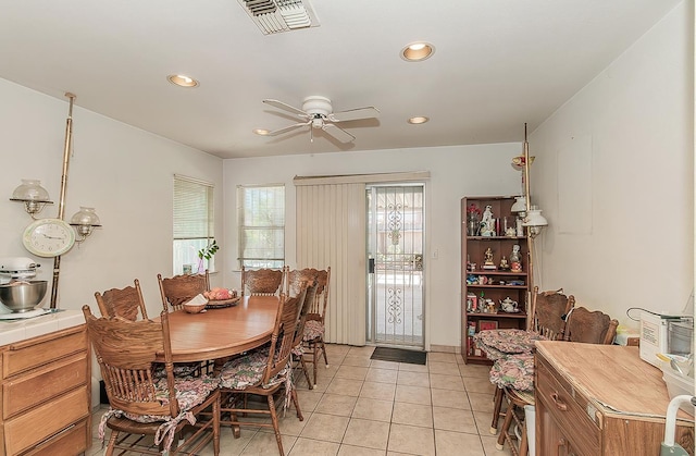 4223 W Yale Ave, Fresno, CA 93722 - dining space featuring ceiling fan, light tile patterned floors, and recessed lighting