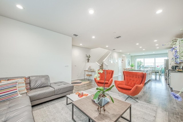 4284 Hillside Rd, Madera, CA 93636 - living area featuring recessed lighting, light wood-style flooring, stairs, and baseboards