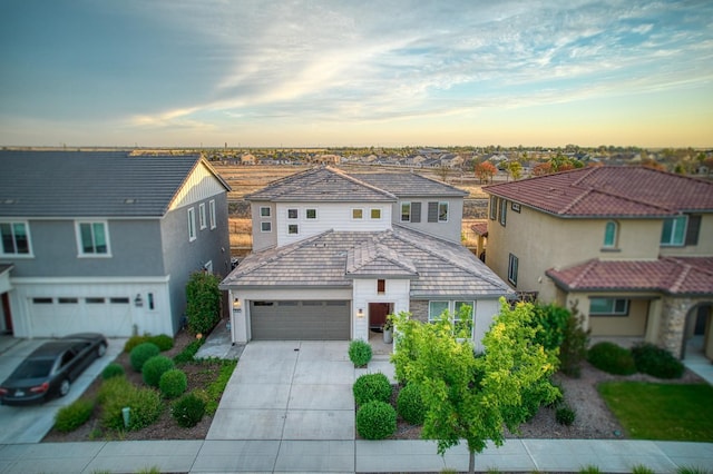 4284 Hillside Rd, Madera, CA 93636 - traditional-style house with concrete driveway, a residential view, and an attached garage