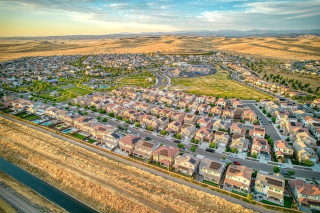 4284 Hillside Rd, Madera, CA 93636 - aerial view of property's location with a mountainous background and nearby suburban area