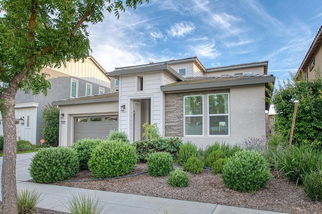 4284 Hillside Rd, Madera, CA 93636 - view of front of home with an attached garage and stucco siding