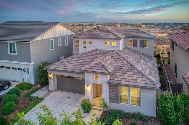 4284 Hillside Rd, Madera, CA 93636 - view of front of property featuring driveway, a garage, and stucco siding