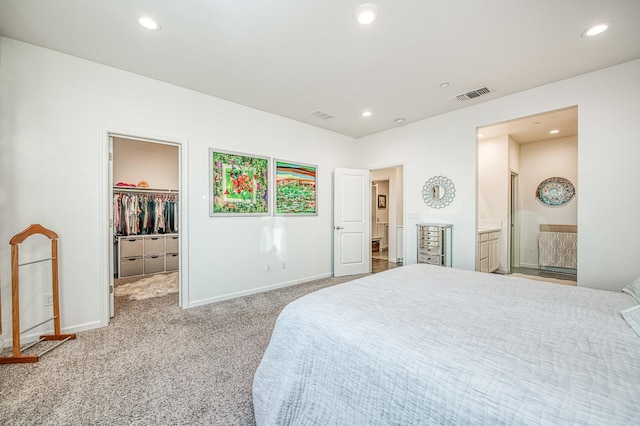 4284 Hillside Rd, Madera, CA 93636 - bedroom with a spacious closet, carpet, recessed lighting, baseboards, and ensuite bath