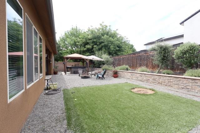3309 Beverly Ave, Clovis, CA 93619 - view of yard featuring a gazebo, a fire pit, and a patio