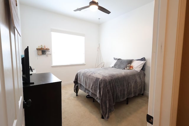 3309 Beverly Ave, Clovis, CA 93619 - bedroom featuring light colored carpet, a ceiling fan, and baseboards