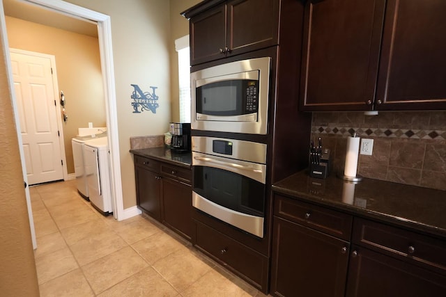 3309 Beverly Ave, Clovis, CA 93619 - kitchen featuring appliances with stainless steel finishes, separate washer and dryer, backsplash, light tile patterned floors, and dark brown cabinets