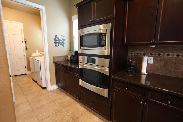 3309 Beverly Ave, Clovis, CA 93619 - kitchen featuring stainless steel appliances, independent washer and dryer, decorative backsplash, light tile patterned floors, and dark brown cabinets