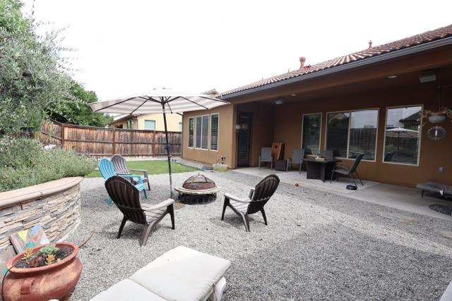 3309 Beverly Ave, Clovis, CA 93619 - view of patio / terrace with an outdoor fire pit