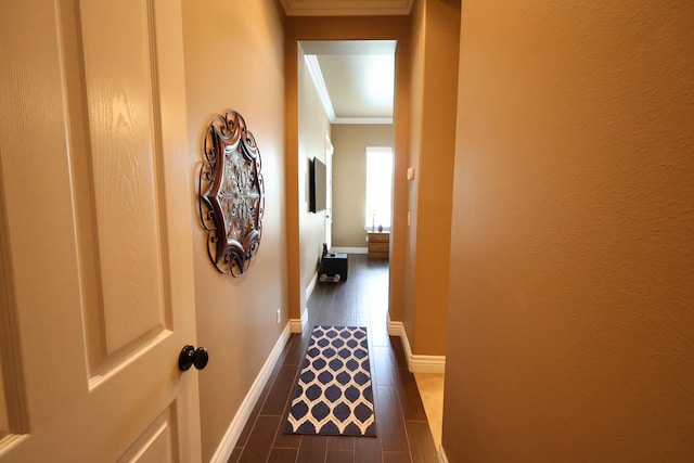 3309 Beverly Ave, Clovis, CA 93619 - corridor with crown molding, baseboards, and dark tile patterned floors