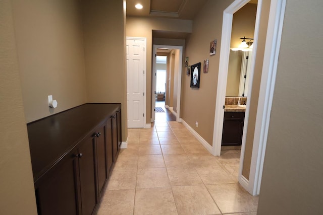 3309 Beverly Ave, Clovis, CA 93619 - hall featuring light tile patterned flooring, baseboards, and recessed lighting
