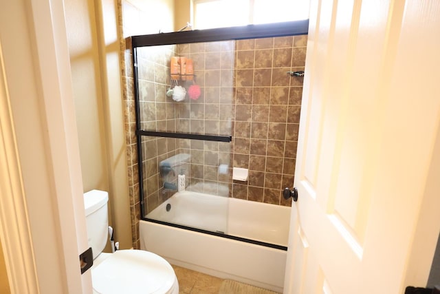 3309 Beverly Ave, Clovis, CA 93619 - full bathroom featuring toilet, combined bath / shower with glass door, and tile patterned floors