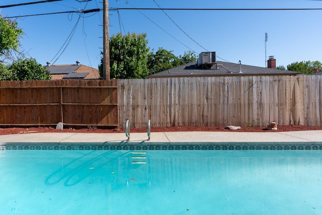 708 E San Jose Ave, Fresno, CA 93710 - view of swimming pool with central air condition unit
