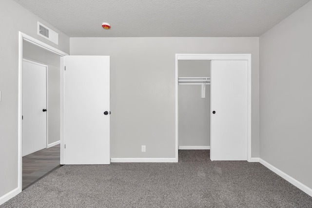 708 E San Jose Ave, Fresno, CA 93710 - unfurnished bedroom with carpet flooring, a closet, baseboards, and a textured ceiling
