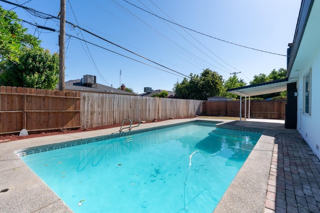 708 E San Jose Ave, Fresno, CA 93710 - view of pool with a fenced backyard and cooling unit