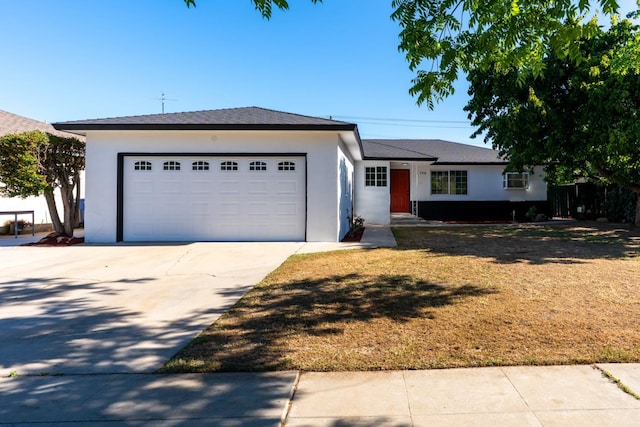708 E San Jose Ave, Fresno, CA 93710 - ranch-style house featuring stucco siding, concrete driveway, and an attached garage
