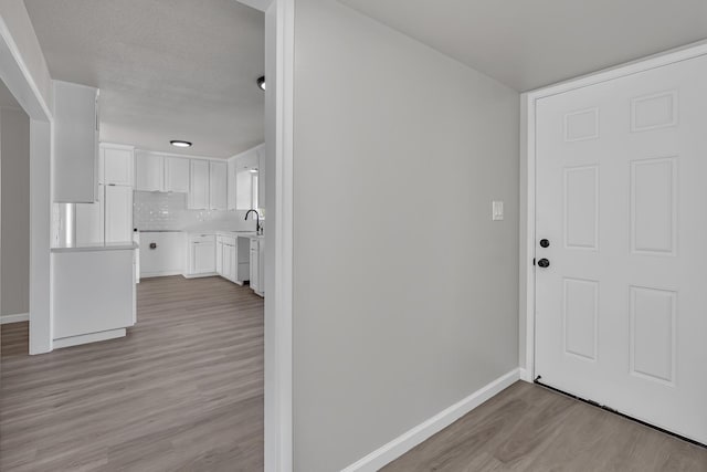 708 E San Jose Ave, Fresno, CA 93710 - entrance foyer with light wood-type flooring and baseboards