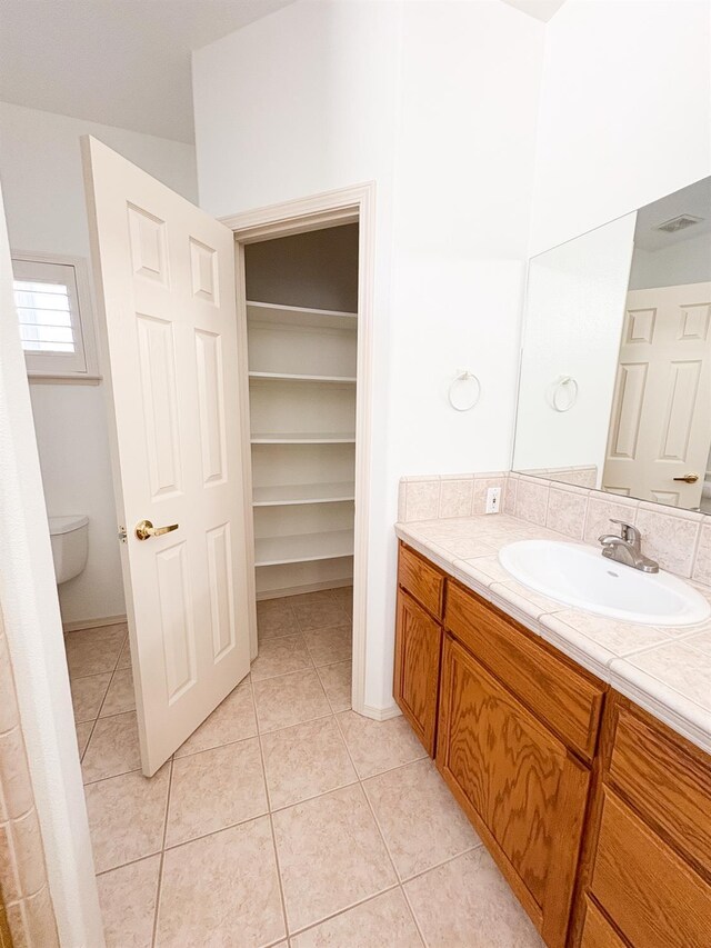 2300 Sierra Ave Unit 129, Kingsburg, CA 93631 - bathroom featuring vanity, tile patterned flooring, and toilet