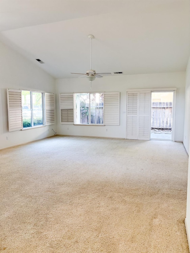 2300 Sierra Ave Unit 129, Kingsburg, CA 93631 - carpeted empty room featuring a ceiling fan and lofted ceiling