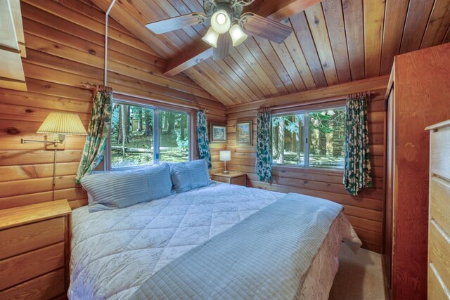 44468 Lakeview Ave, Shaver Lake, CA 93664 - carpeted bedroom with multiple windows, wood ceiling, rustic walls, and a ceiling fan