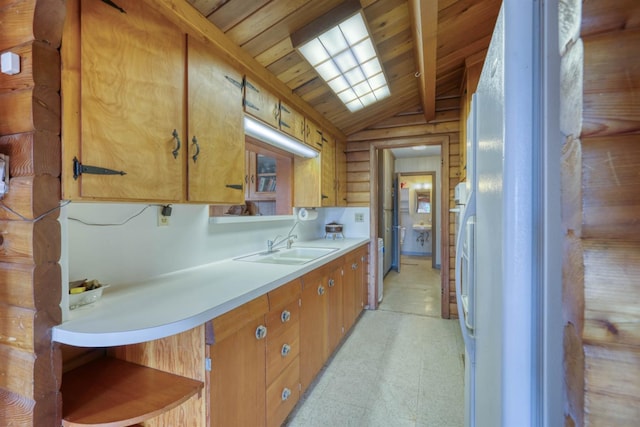 44468 Lakeview Ave, Shaver Lake, CA 93664 - kitchen with a sink, wooden ceiling, light countertops, light floors, and brown cabinetry