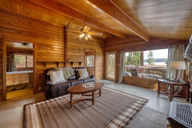 44468 Lakeview Ave, Shaver Lake, CA 93664 - living room with healthy amount of natural light, a ceiling fan, wooden ceiling, and wood walls