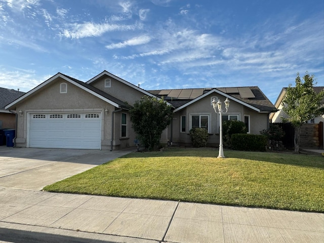 3351 Winter Way, Madera, CA 93637 - ranch-style house featuring a garage, driveway, a front yard, and stucco siding