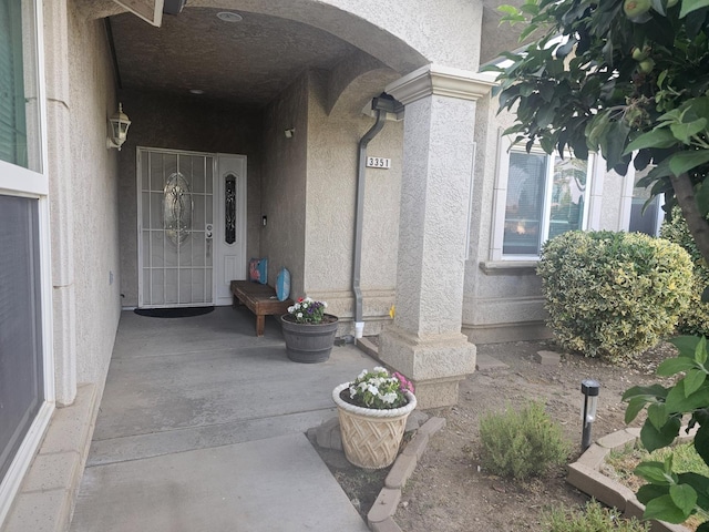 3351 Winter Way, Madera, CA 93637 - doorway to property featuring stucco siding
