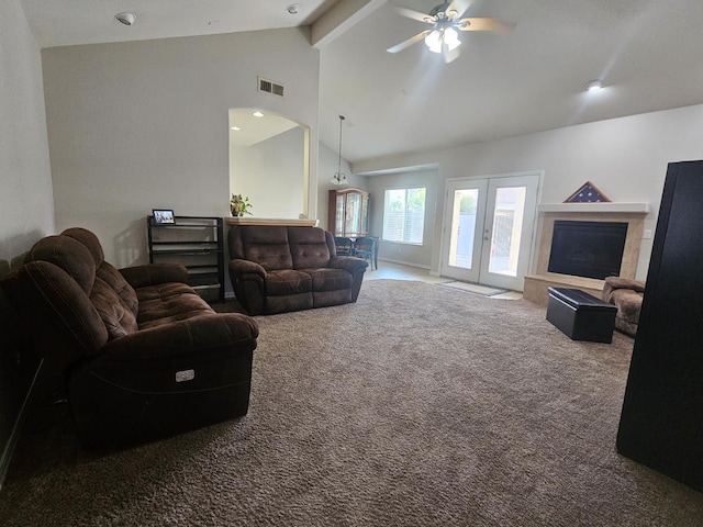 3351 Winter Way, Madera, CA 93637 - carpeted living room with beam ceiling, ceiling fan, high vaulted ceiling, arched walkways, and french doors