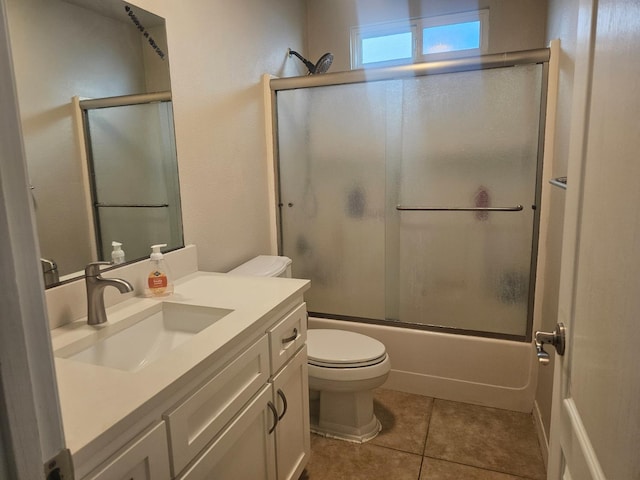 3351 Winter Way, Madera, CA 93637 - bathroom with toilet, vanity, combined bath / shower with glass door, and tile patterned flooring