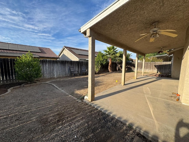 3351 Winter Way, Madera, CA 93637 - fenced backyard featuring a ceiling fan and a patio