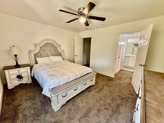 2909 Huntington Blvd Unit 207, Fresno, CA 93721 - bedroom with carpet flooring, baseboards, ceiling fan, and a walk in closet