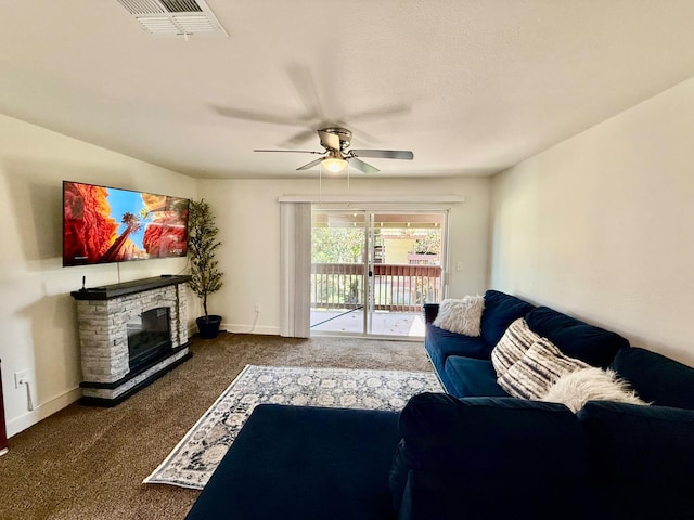 2909 Huntington Blvd Unit 207, Fresno, CA 93721 - living area with carpet, ceiling fan, a fireplace, and baseboards