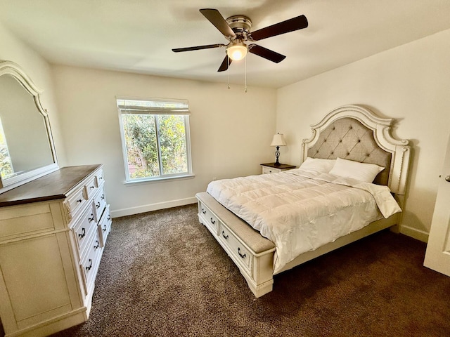 2909 Huntington Blvd Unit 207, Fresno, CA 93721 - bedroom featuring dark carpet, baseboards, and ceiling fan