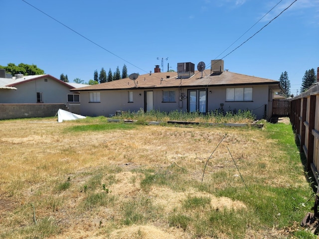3023 E Robinson Ave, Fresno, CA 93726 - rear view of house with french doors and cooling unit