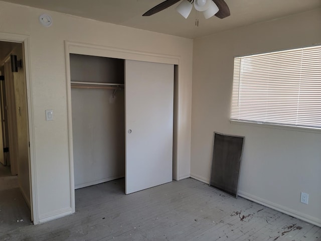 3023 E Robinson Ave, Fresno, CA 93726 - unfurnished bedroom with light wood-type flooring, a closet, and baseboards