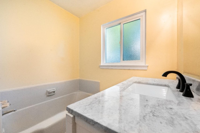 2744 E Michigan Ave, Fresno, CA 93703 - full bath with a garden tub, vaulted ceiling, and vanity
