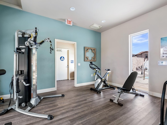 6053 E Brick Dr, Fresno, CA 93727 - exercise room featuring wood finished floors and recessed lighting