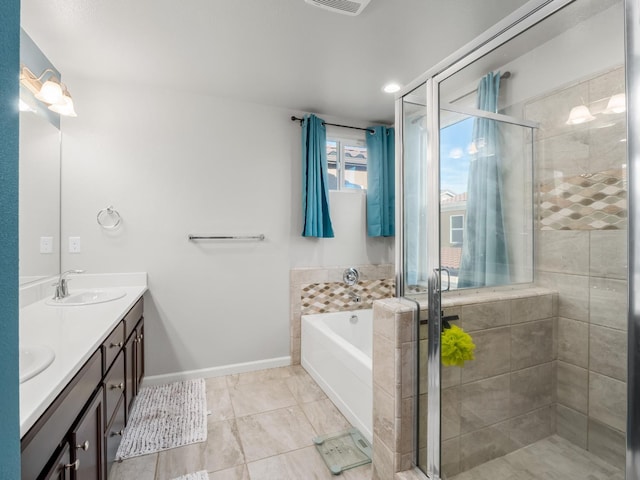 6053 E Brick Dr, Fresno, CA 93727 - bathroom with double vanity, a garden tub, a stall shower, and tile patterned floors