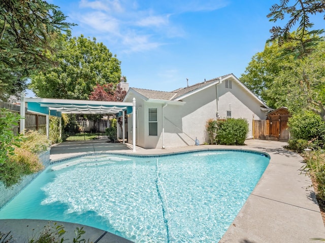 6185 N Milburn Ave, Fresno, CA 93722 - view of pool with a patio area